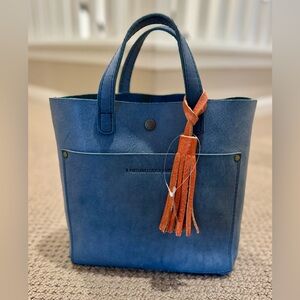 Portland Leather min crossbody tote in Indigo (retired color)